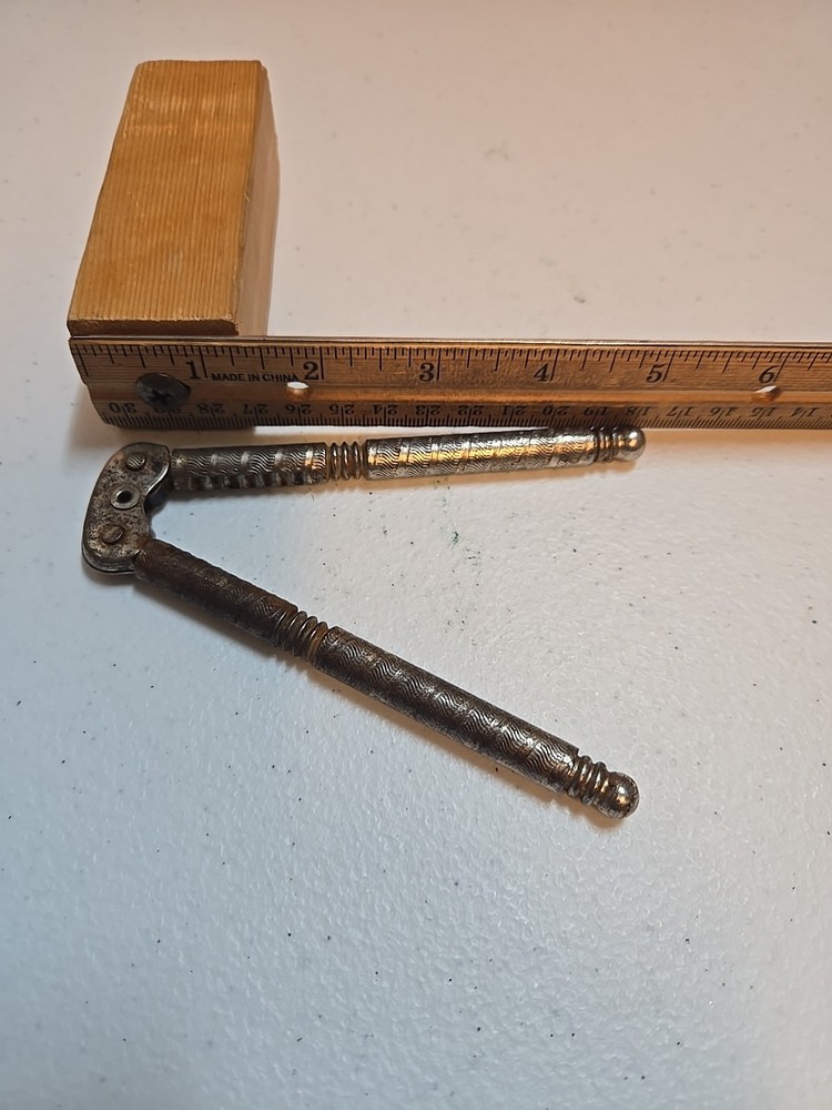 Vintage Metal Nutcracker; Spring Loaded