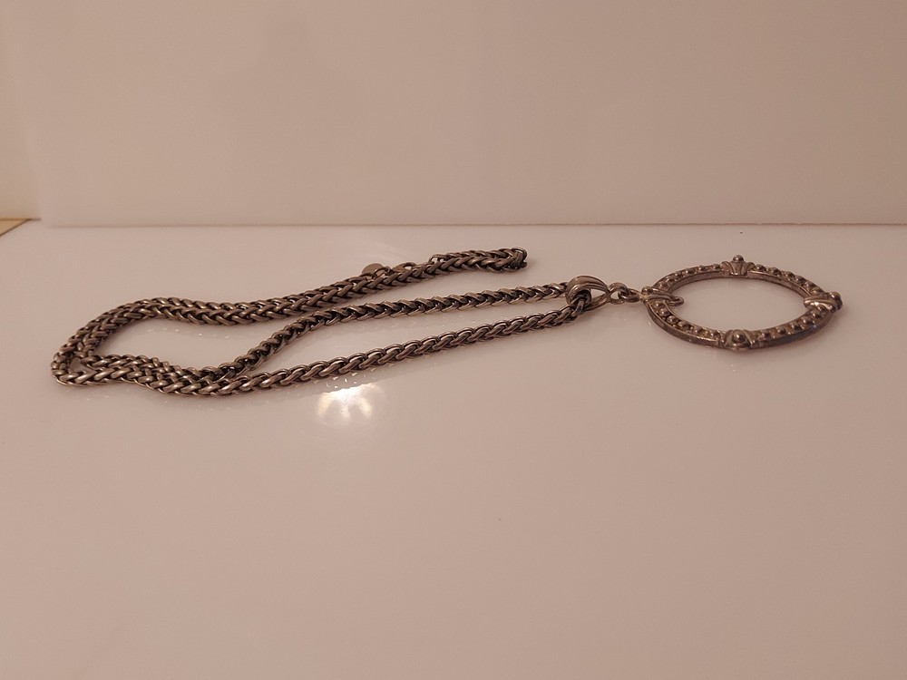 big circular & silvertone chain necklace pendant flawed signed "IS" or "JS"