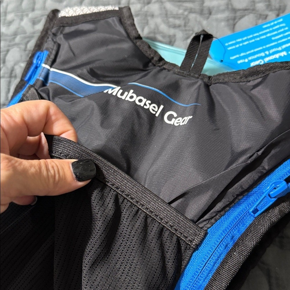 Mubasel Gear hydration backpack hiking storage compartments lightweight outside