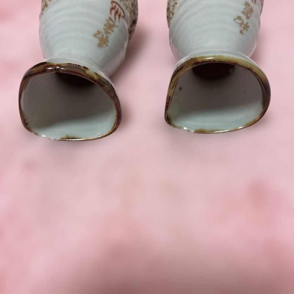 2 sake bottles with Wakura Onsen logo