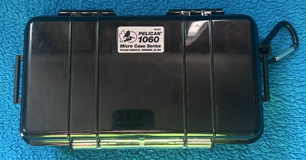 Pelican ™ 1060 Solid Black Micro Case includes Rubber Cushion Insert