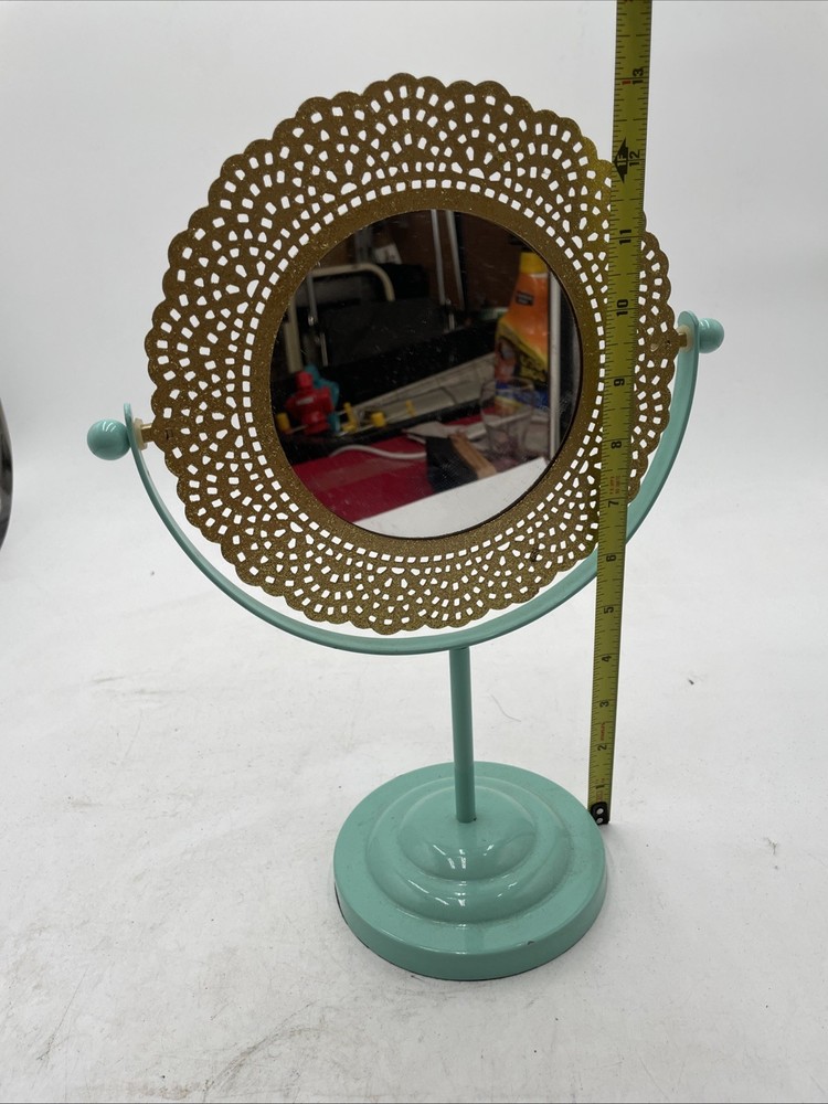 Vintage Tabletop Mirror With Gold Frame And A Blue Base