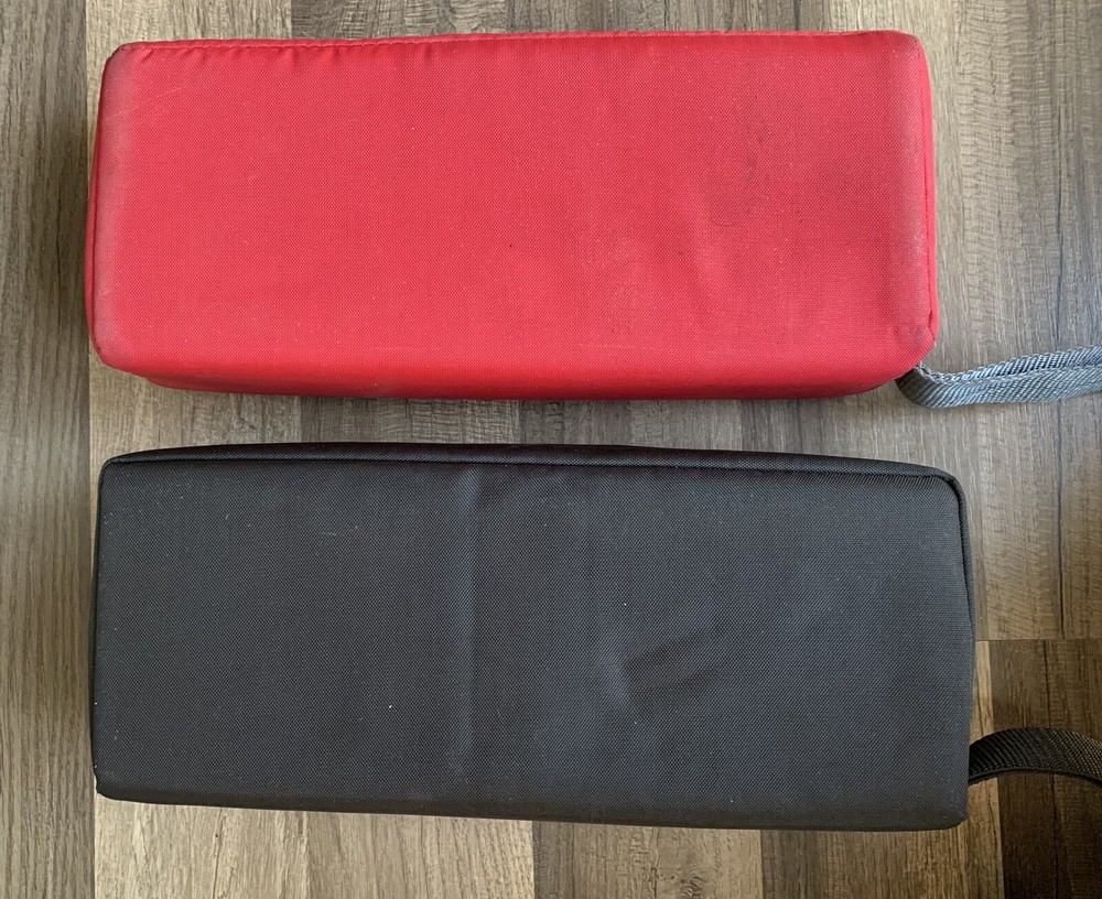 2- Case Logic 15-Cassette Cases (one Red, One Black)