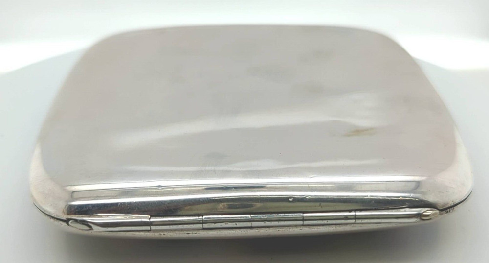 Silver and Enamel Cigarette Case with Unique Automobile Motif
