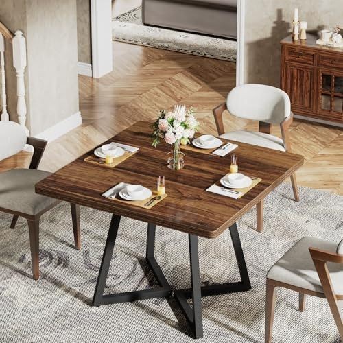 Dining table A brown industrial kitchen table with a black metal frame