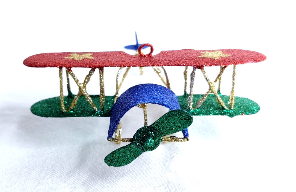 PIER ONE GLITTERED PLANE ORNAMENT