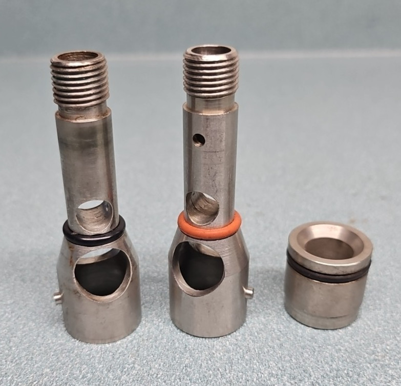 Assorted Manitowoc Ice machine parts.