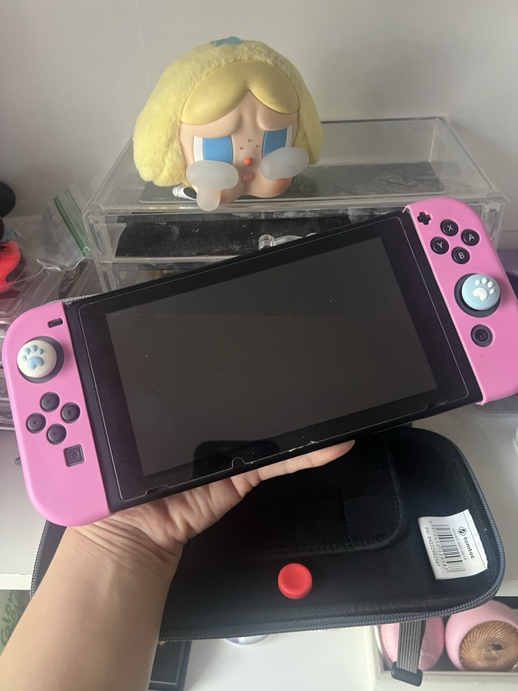 Nintendo Switch Console w/ Joy-Con, Grip, tomtoc Case, Thumb Grips