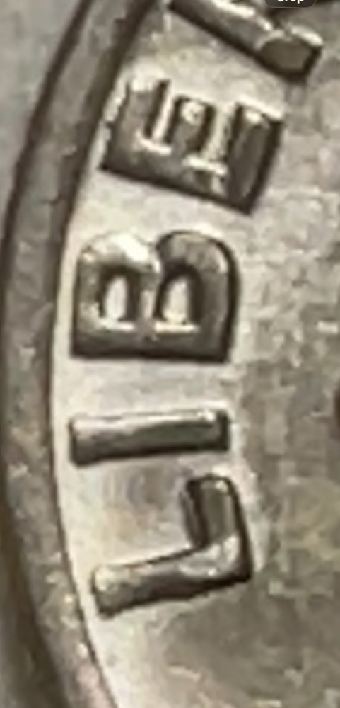 1973 no mint mark dime with DDO error