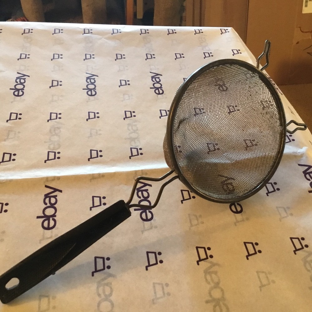 small old metal strainer basket