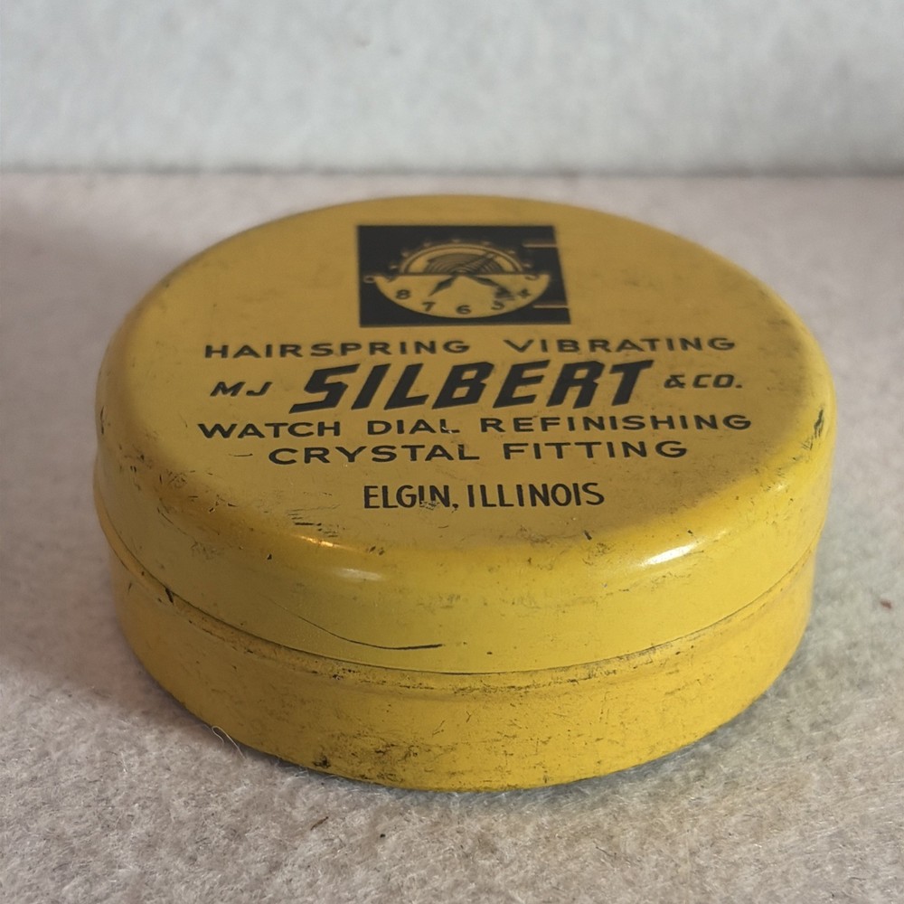 1950’s Silvery Watch Tin Container 2 Inch Diameter