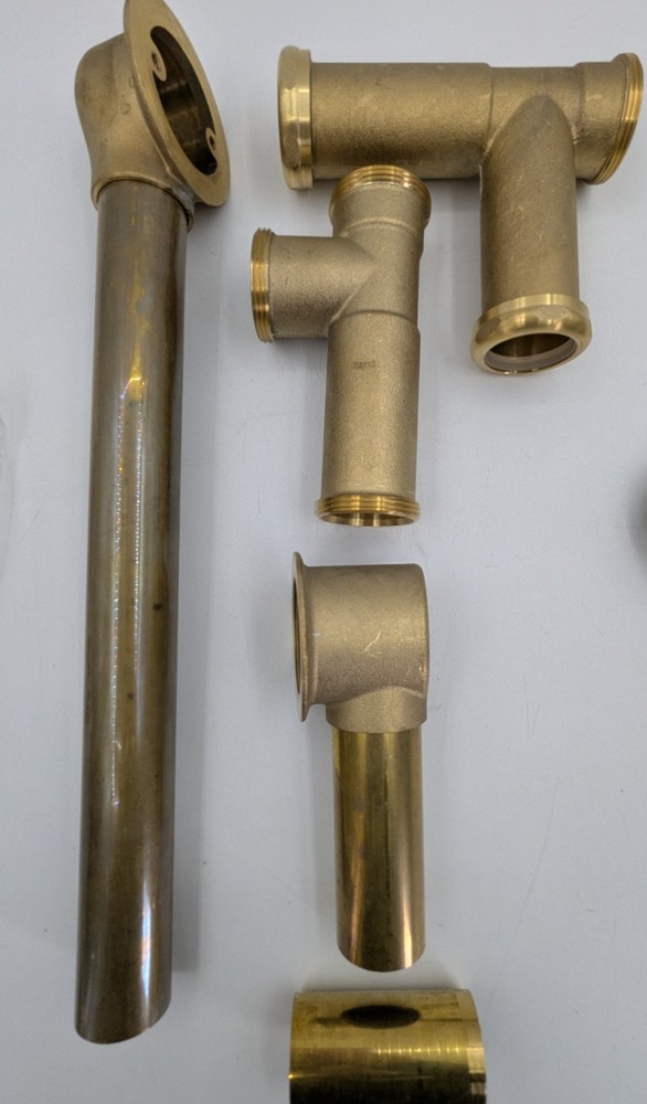 American Standard Universal Drain Minimum Depth: 14" Maximum Depth: 18-1/2"