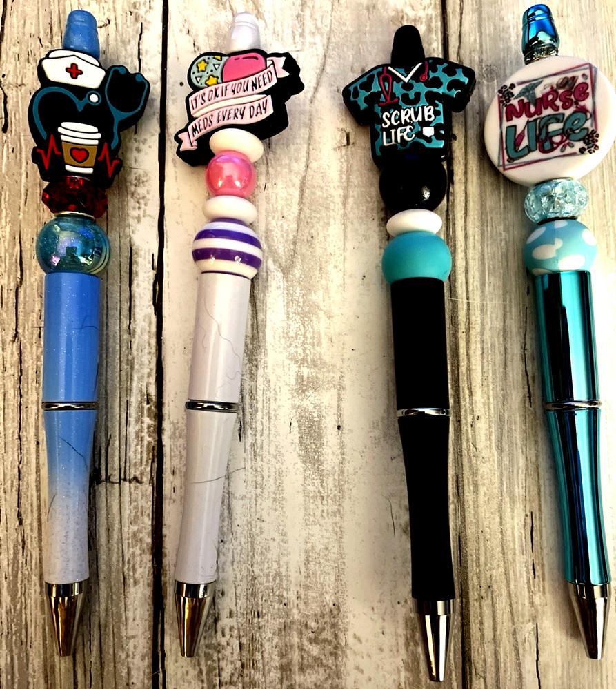 4 miscellaneous beaded pens with 1 ink refill each