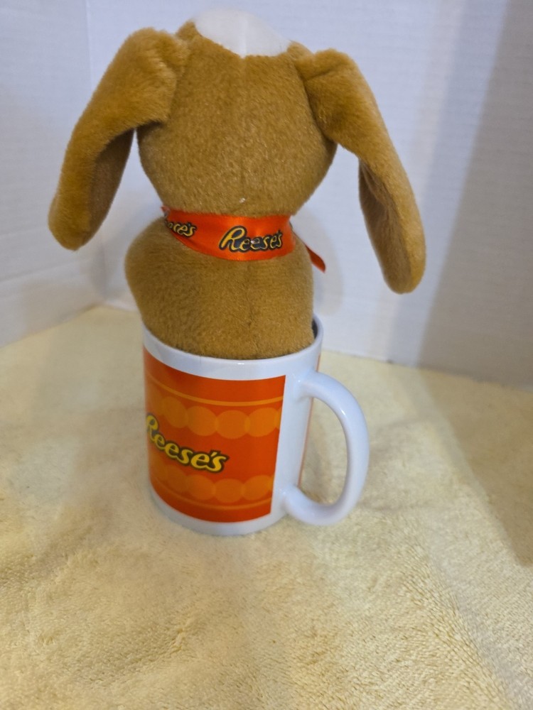 Reeses Pieces Coffee Cup With Plush Brown Dog