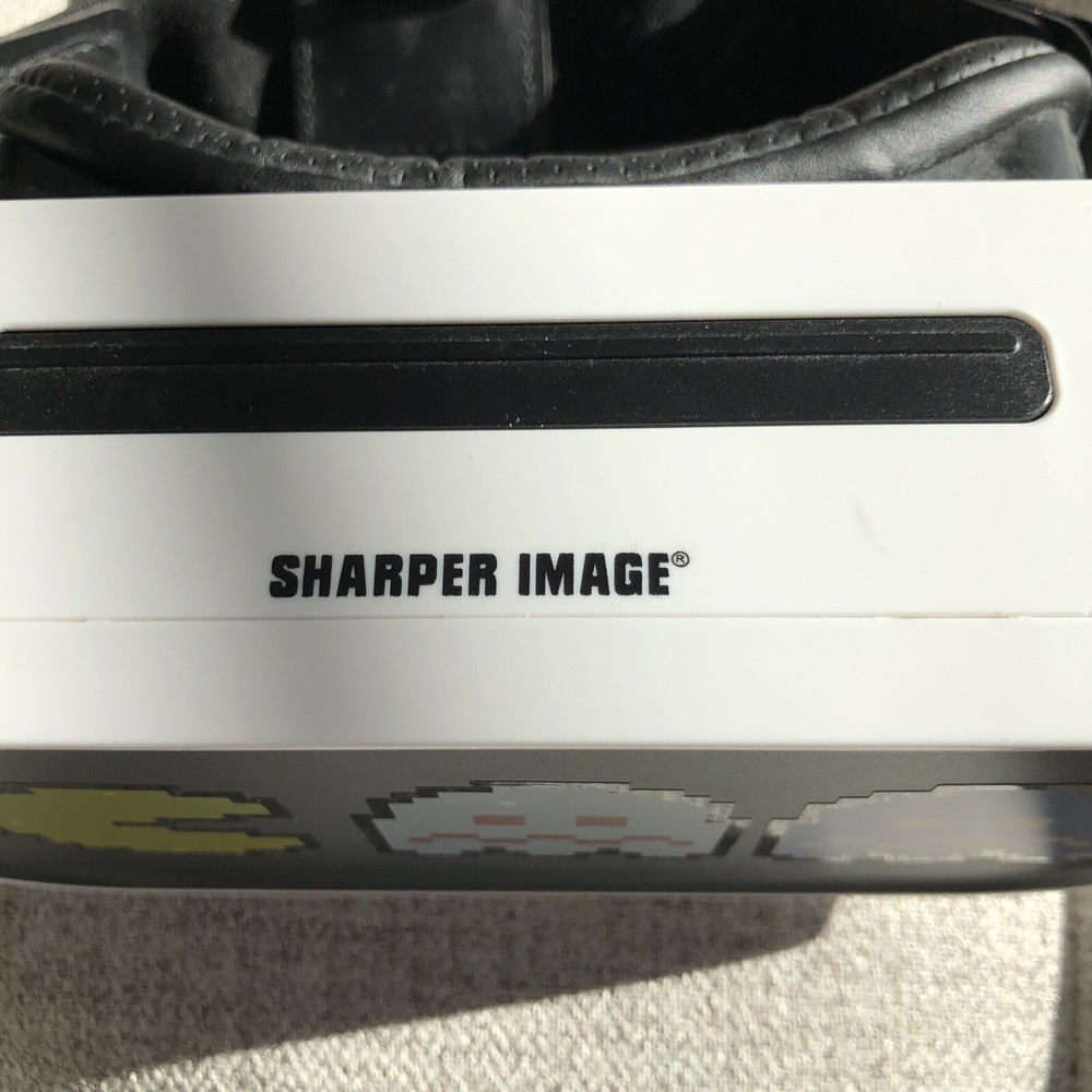 SHARPER IMAGE VR HEADSET WITH PAC MAN STICKERS