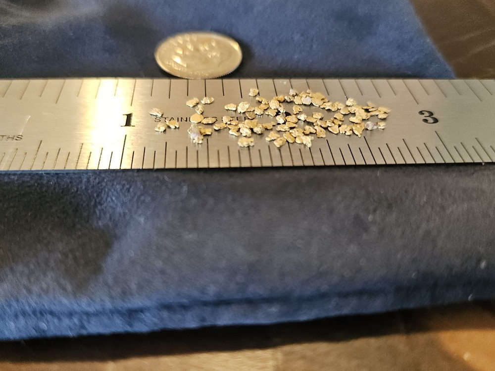 1.0g of Tiny 21k gold flecks