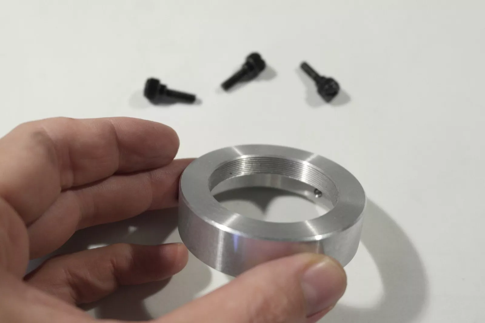 Custom T mount female adapter and lens holder for digiscoping microscopy