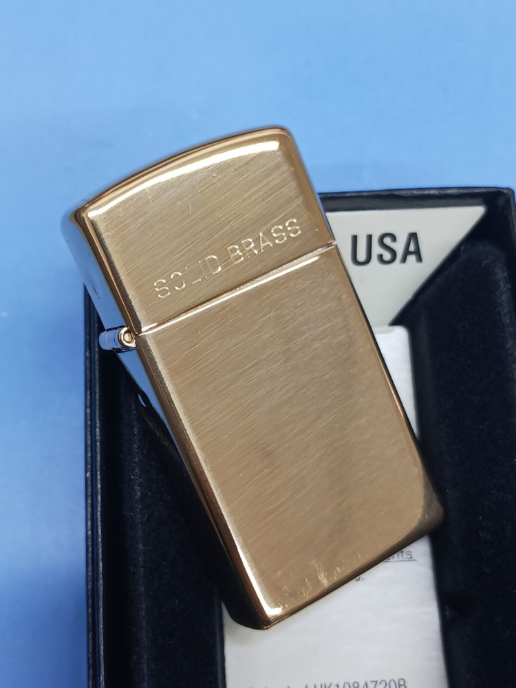 Zippo Slim High Polish Brass with Solid Brass Engraved 1654