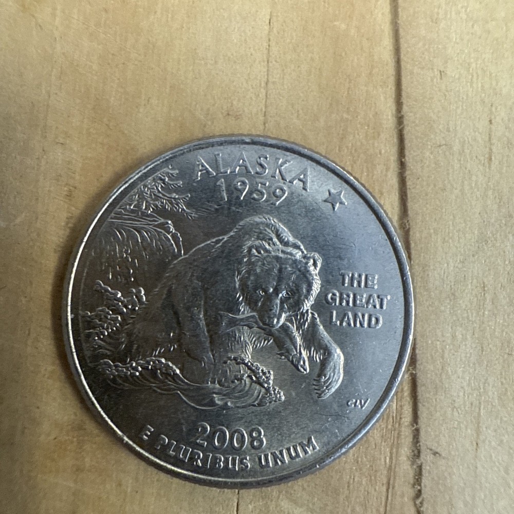 2008 P Alaska quarter dollar bear claw error along with symmetric dimples errors