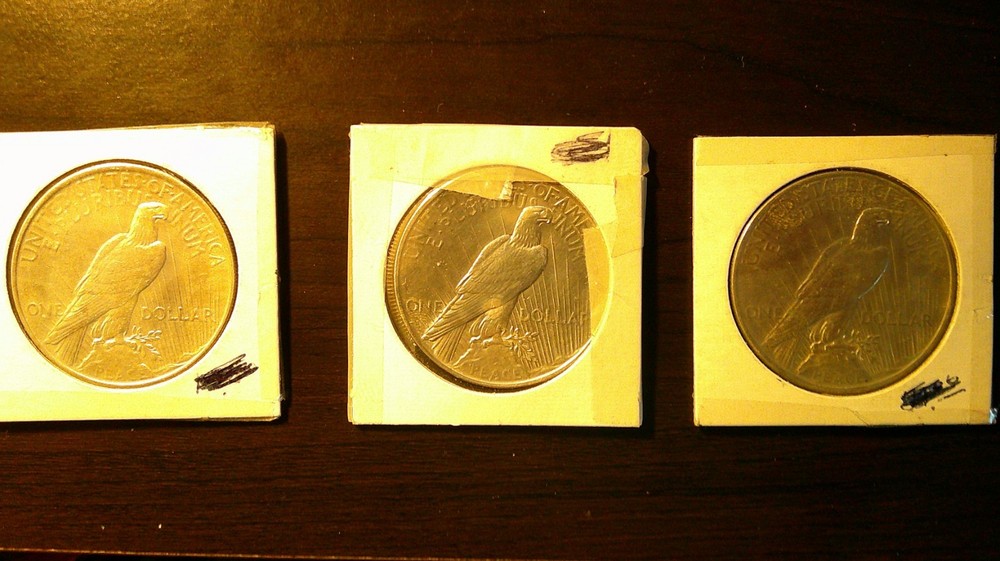 THREE 90% SILVER 1922P B.U. PEACE DOLLARS