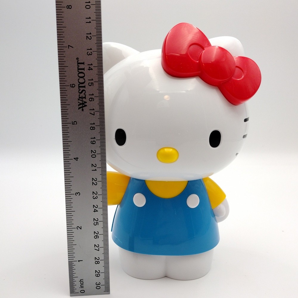 Sanrio Hello Kitty Dancing Waving Figure 7" tall Red Bow