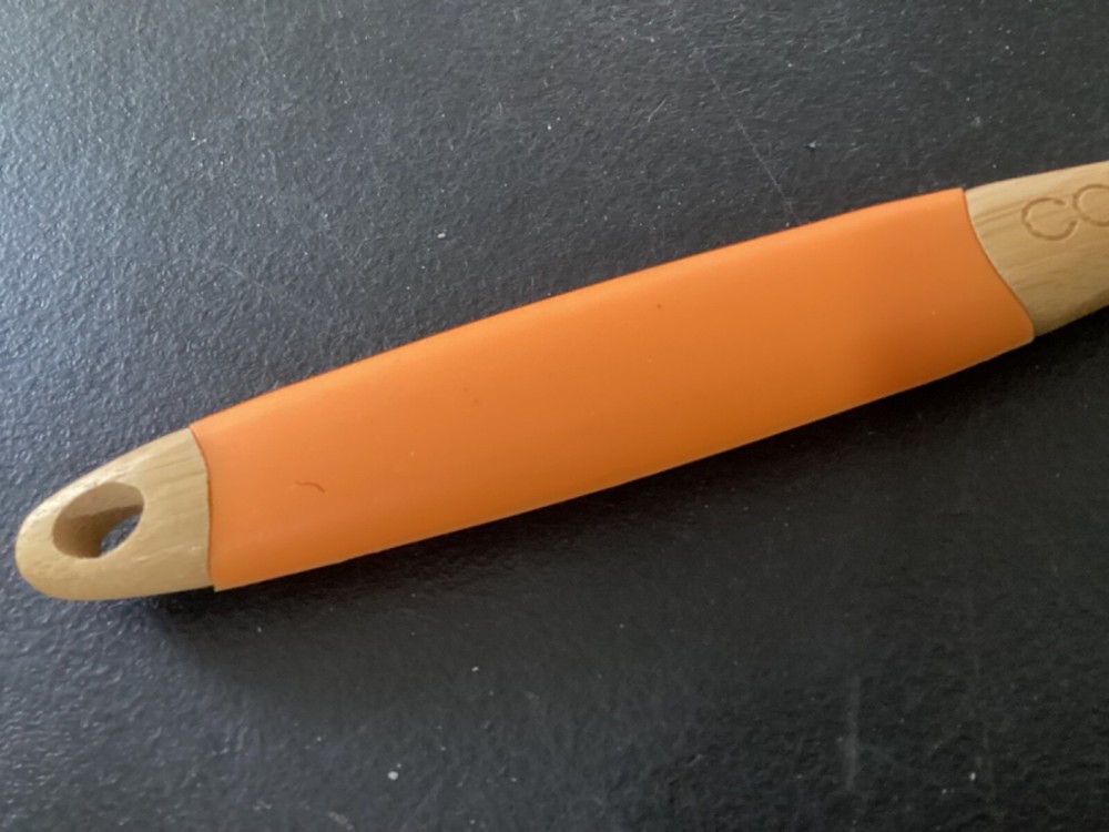 Wooden Spoon with orange rubber handle