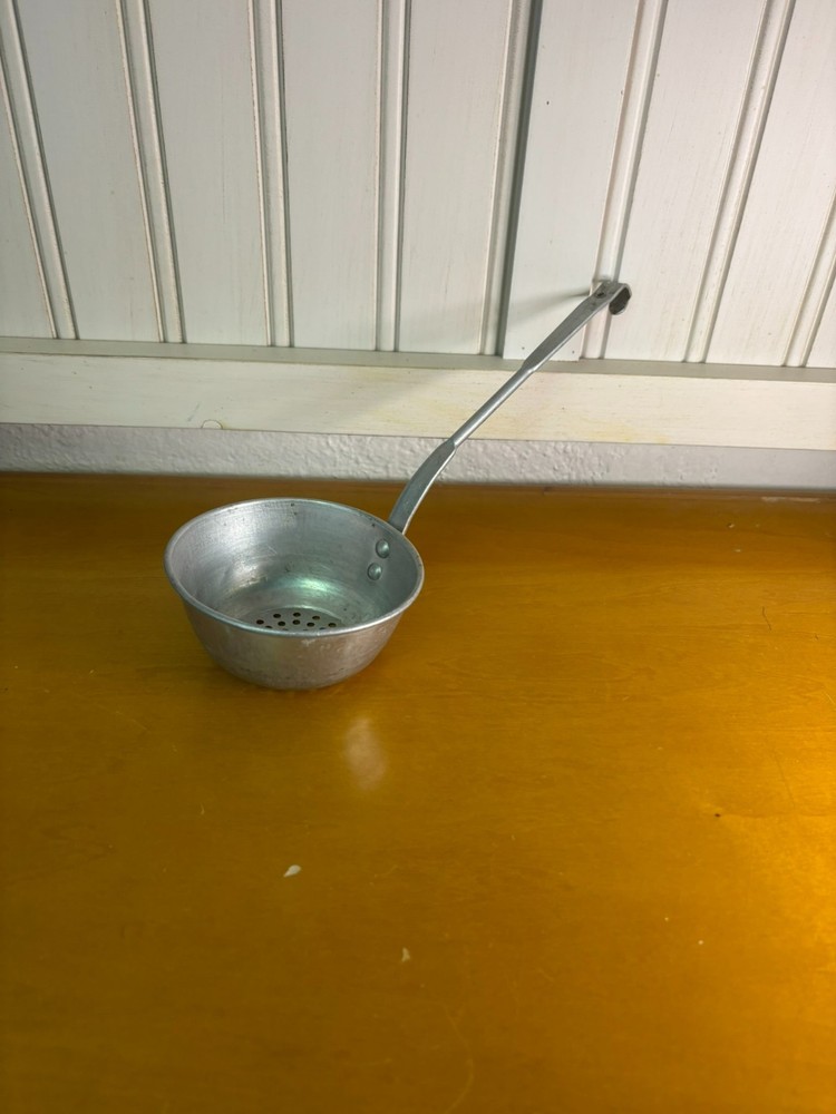 small vintage aluminum strainer