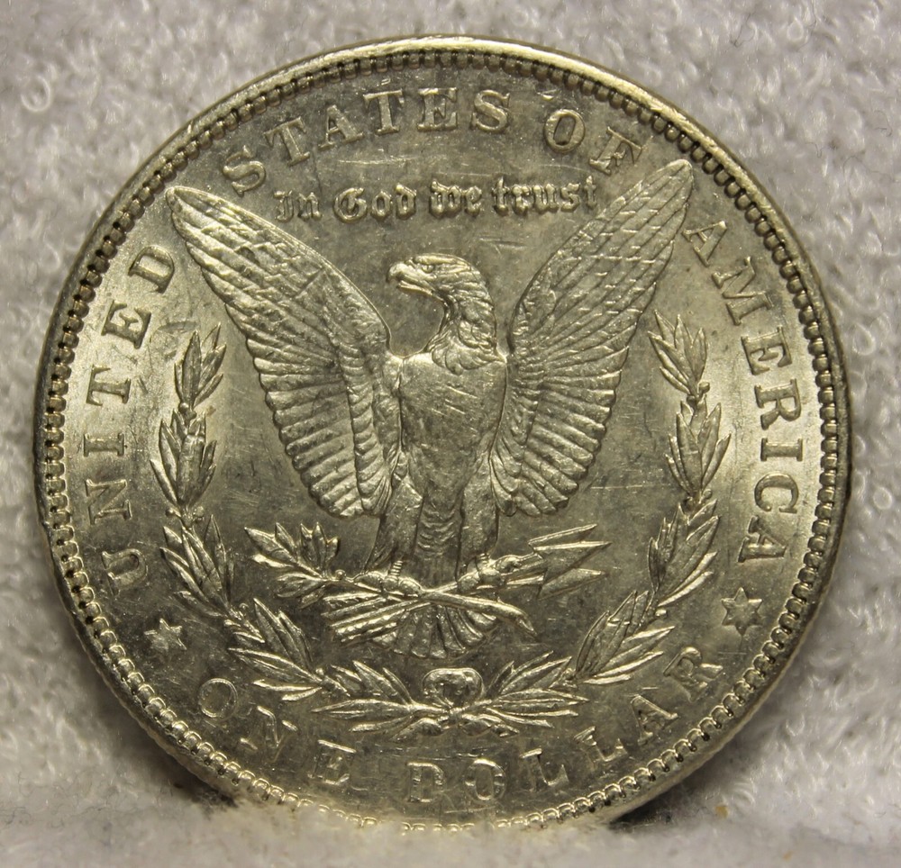 1904 AU plus morgan silver dollar
