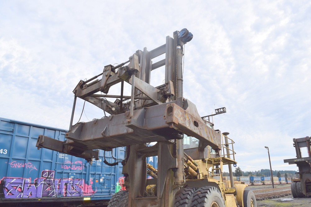 Hyster H 1050 E forklift with, container handler Attachment, Cummins M-11,