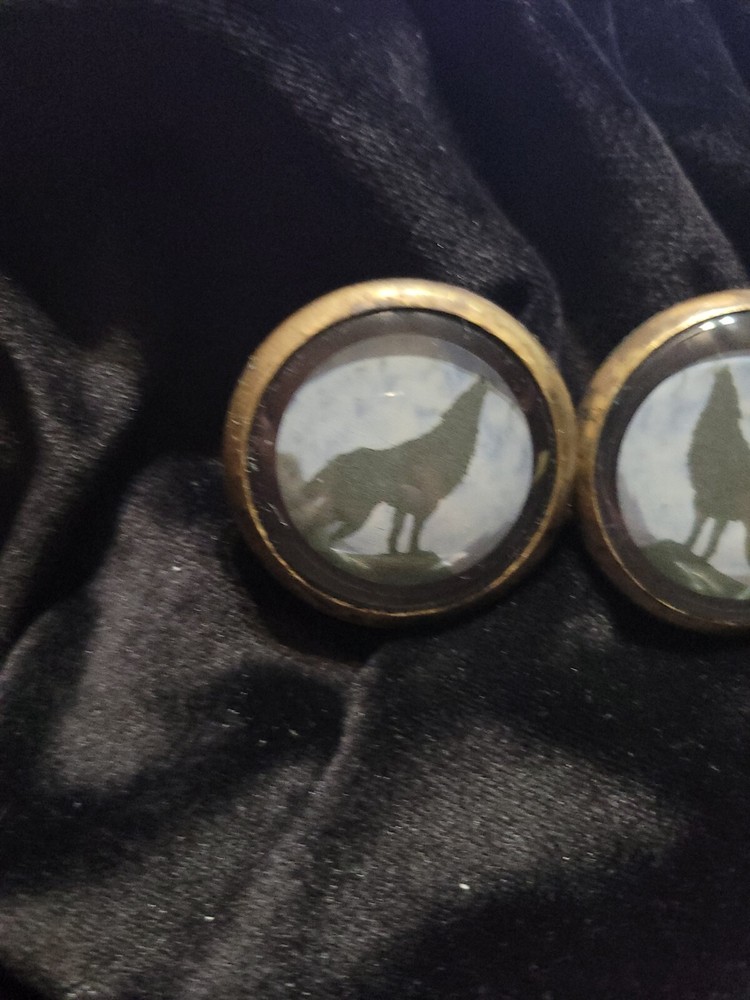 Bridle Rosette's Wolves adv 2 in brass and glass