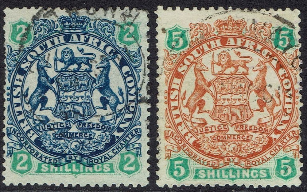 RHODESIA 1896 LARGE ARMS 2/- AND 5/- USED