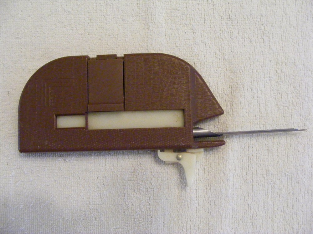 BROWN AND WILLIAMSON FILTER CIGARETTE MAKER