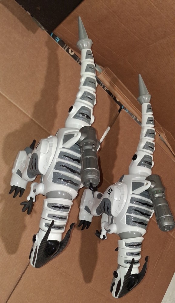 WowWee Roboraptor Remote-Controlled Robot Dinosaur 2-Pack with Remotes, White/G…