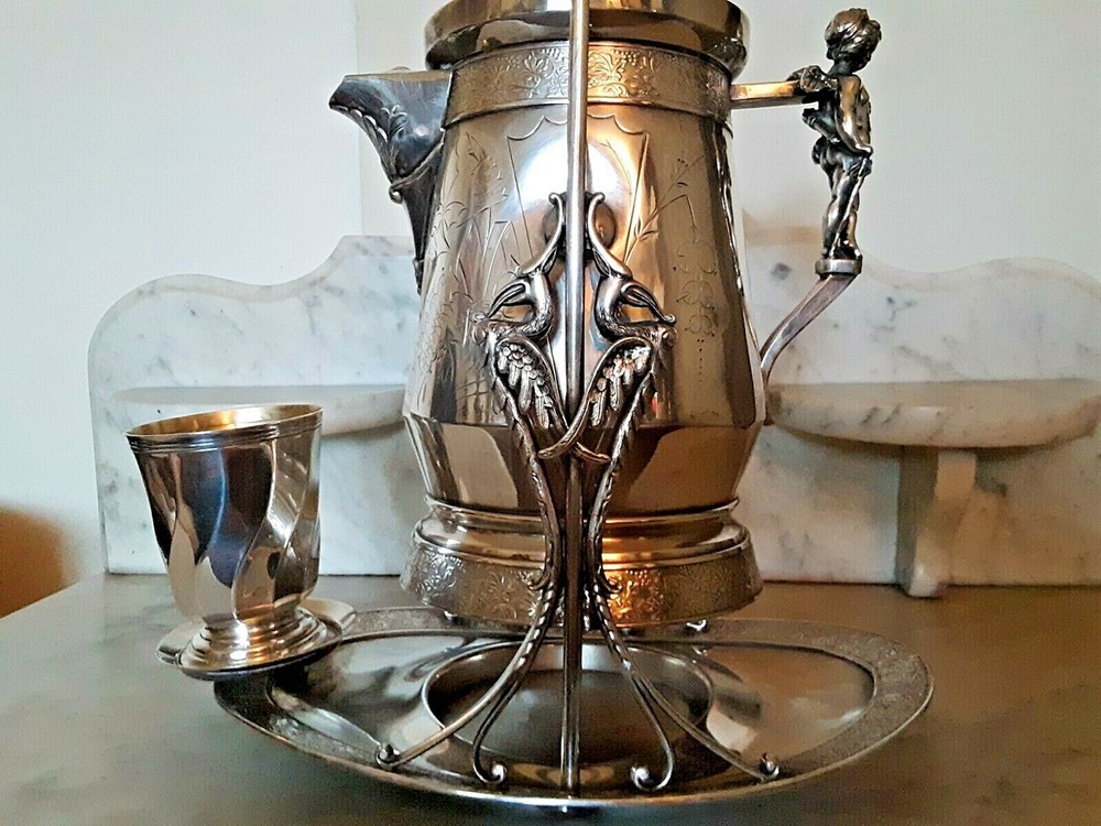 Wilcox Silver Plating Co. c.1870 Tilting Water Pitcher W/Cherub & Storks