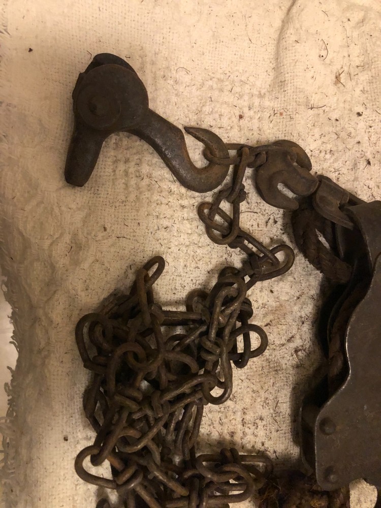 Antique primitive rope and chain hoist