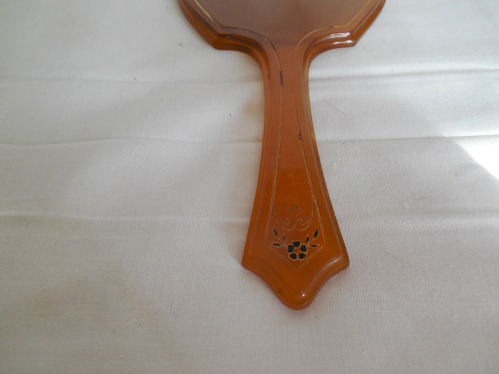 Vintage large bakelite hand mirror