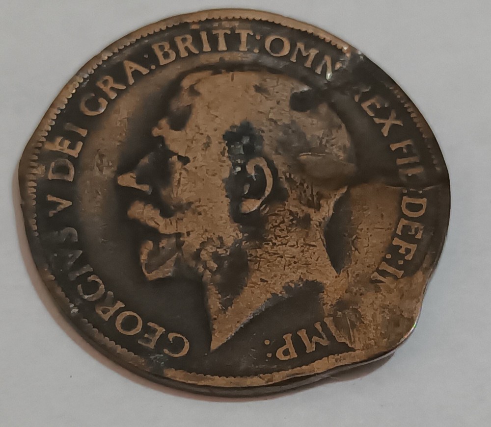 George V and George VI coins with error