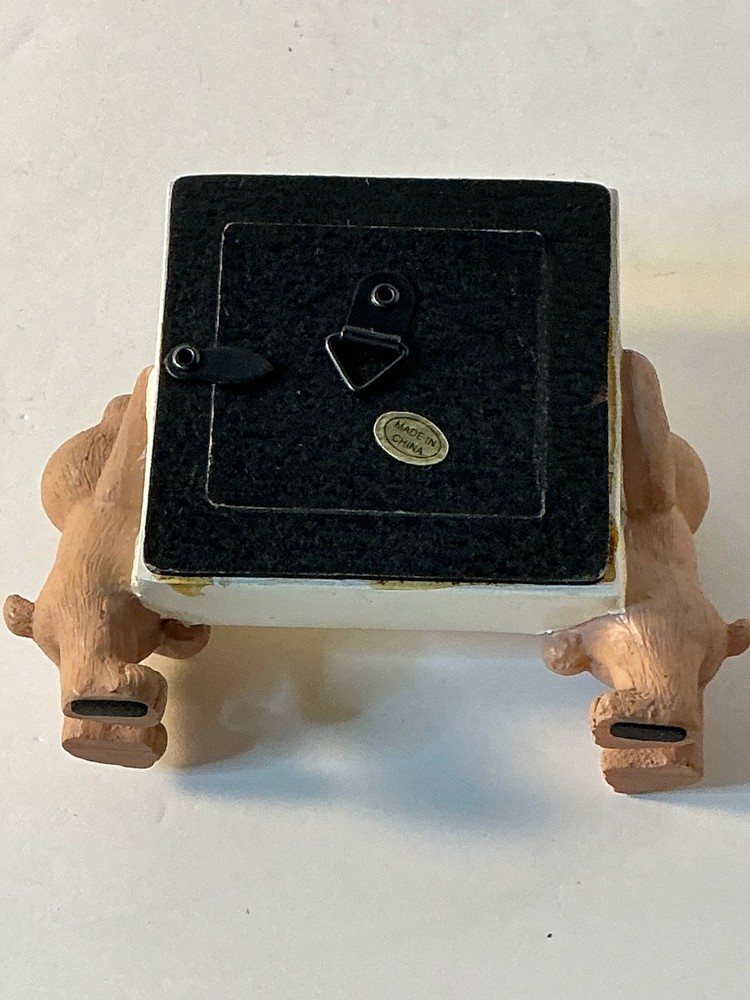 Two bears holding a picture frame "Someone special"