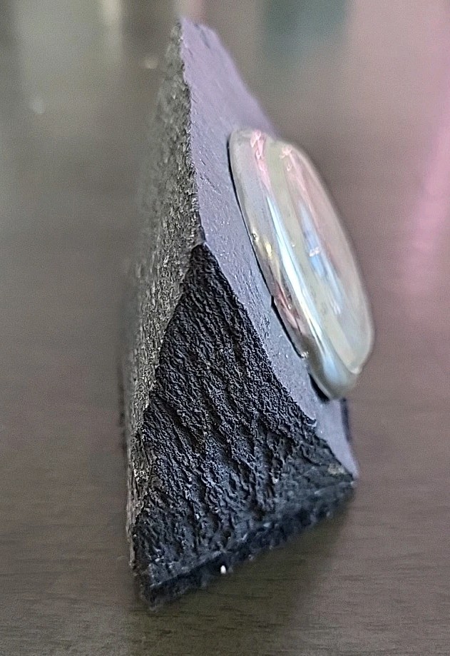 Vintage Desktop Thermometer on Jagged Stone.