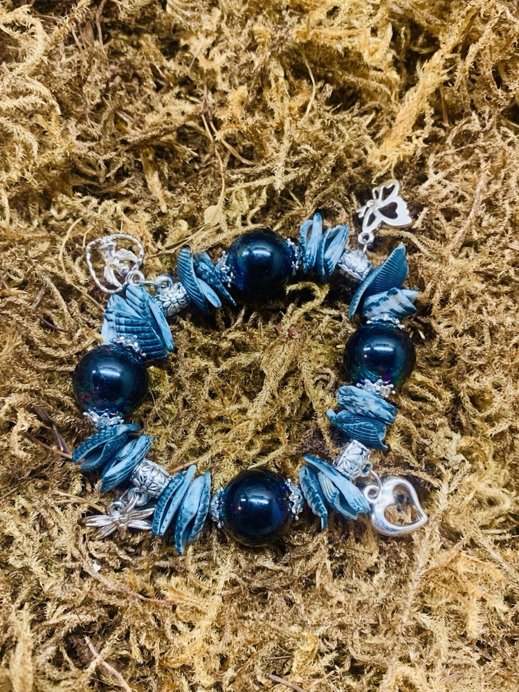 Handcrafted stretchy beaded shell charm bracelet