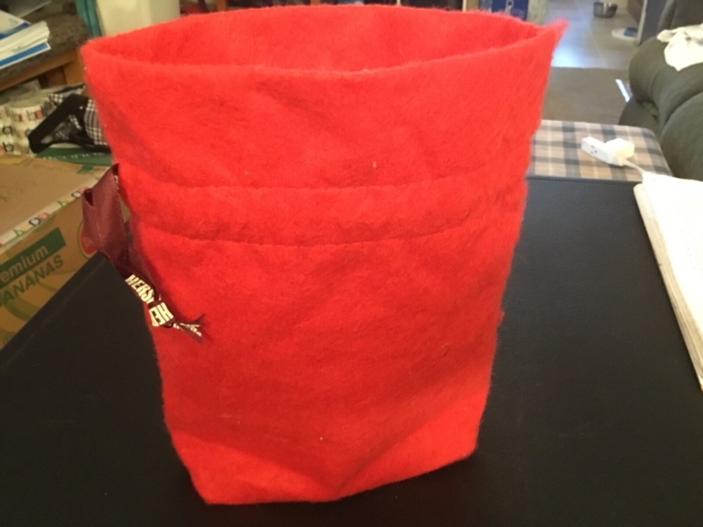 Hershey's Holiday Cloth Draw String Bag with Santa Face on it