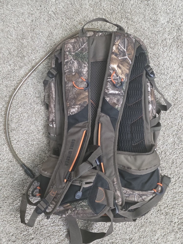 Game Winner Camouflage Hydration Backpack Tons of pockets. Rain Fly