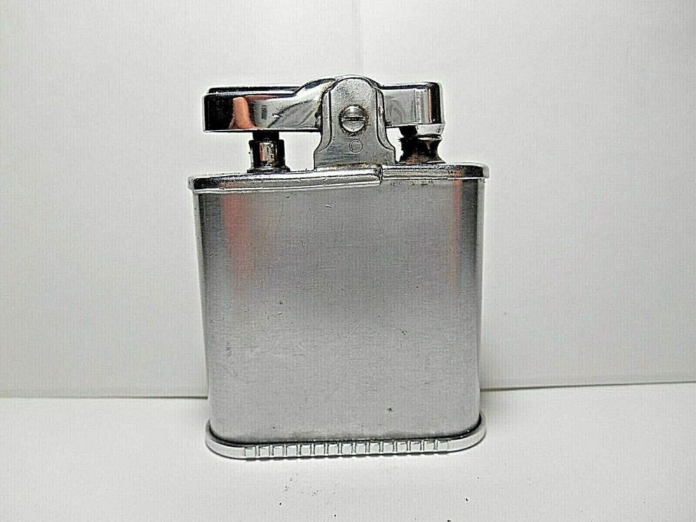 Vintage Ronson WHIRLWIND CHROME CIGARETTE LIGHTER. ETCHED 14TH CENTURY SHIELDS