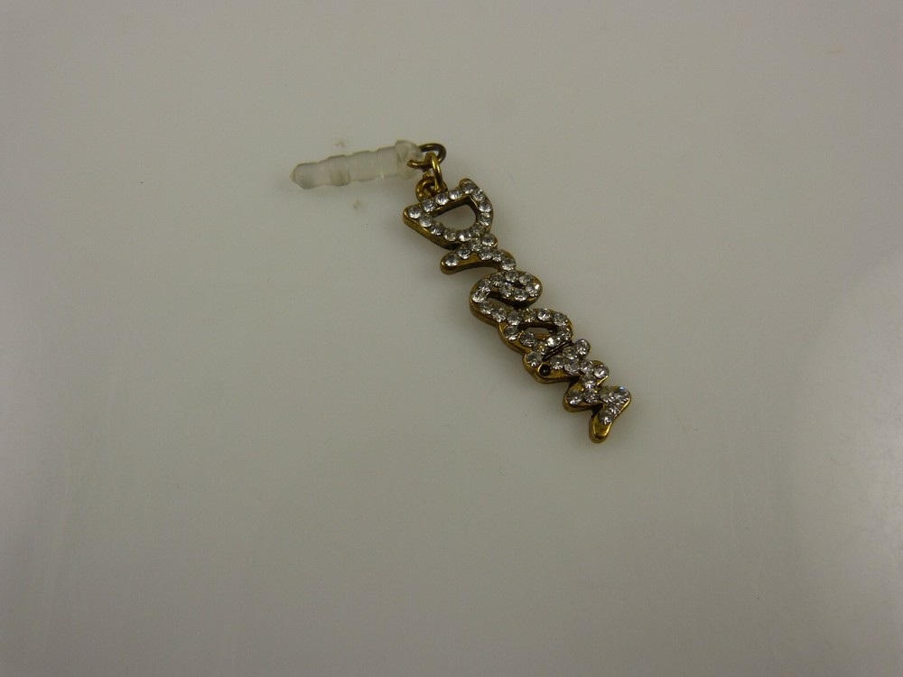 dream cell phone or Ipad charm ear cap dust plug