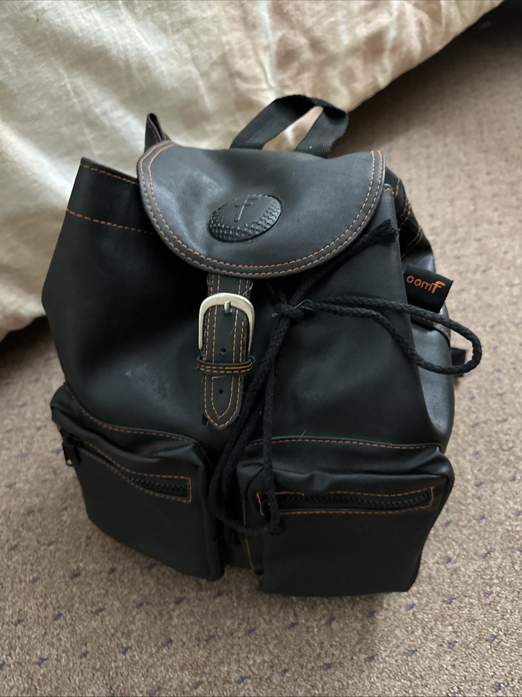 vintage-style black leather backpack