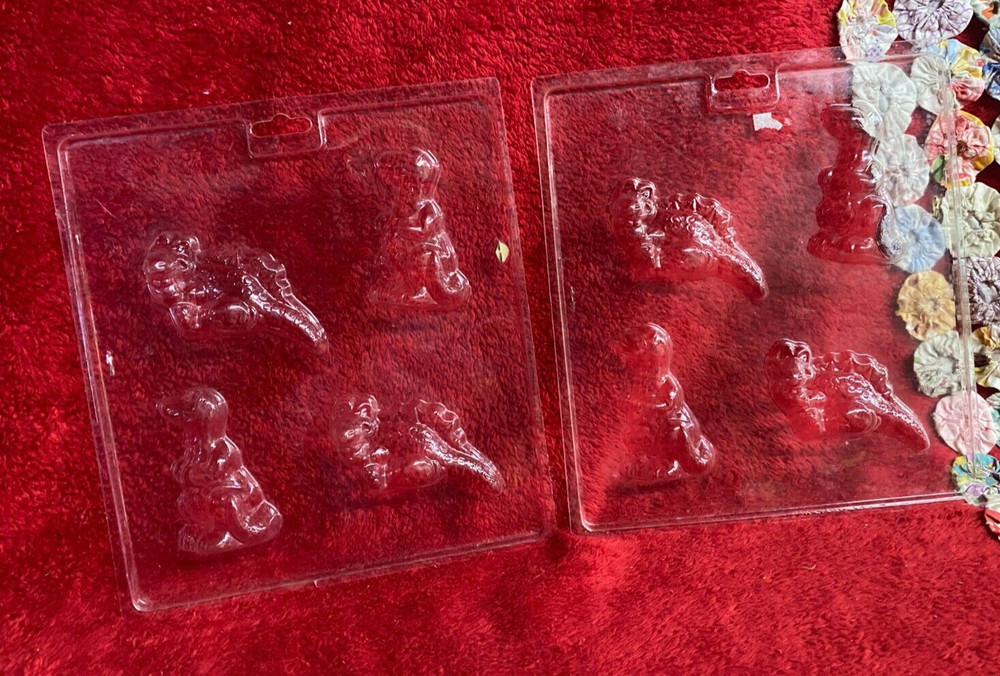2 Dinosaur Chocolate Molds with Four Different Dinosaurs