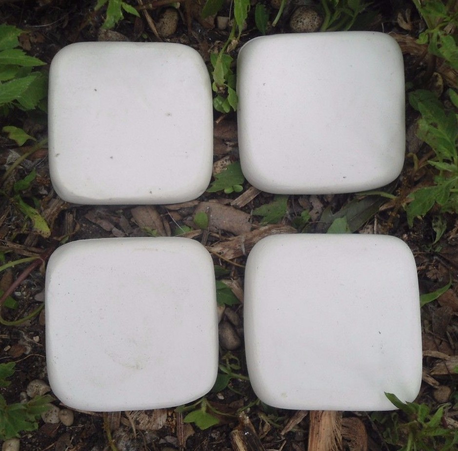 4 resin tile molds from each just under 2" x 1/3" thick