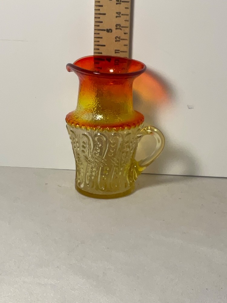 multicolor Amberina glow small glass pitcher 4”