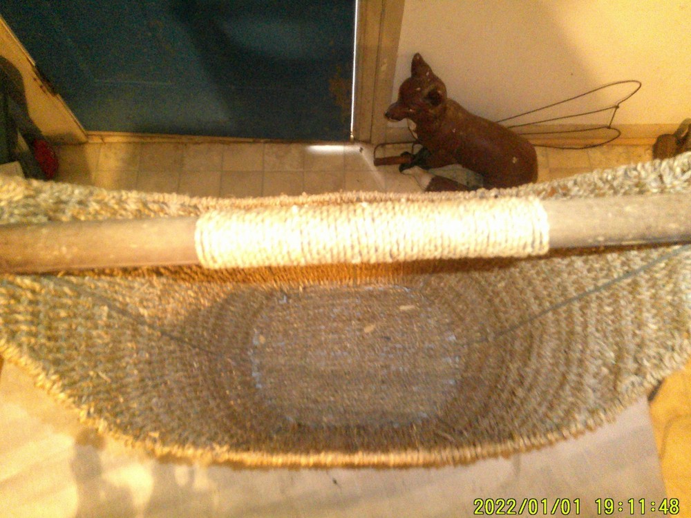OLDER WIRE FRAMED WEAVED MAGAZINE BASKET