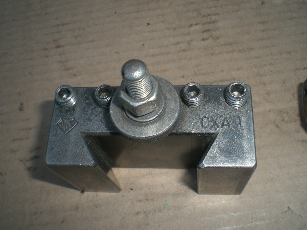 Genuine Aloris CXA tool post with 4 tool holders